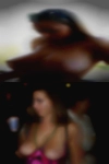 Older naked woman pissing